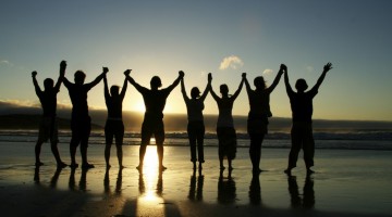 holding-hands-on-beach-1024x656